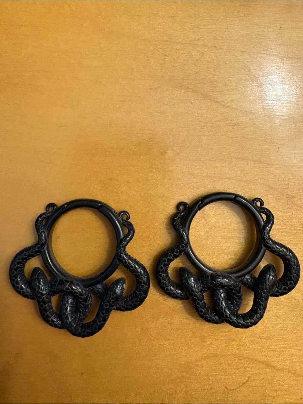 Black Serpentine Hoop Earrings – Snake Motif Statement Pair